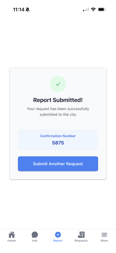 App confirmation screen reading Report Submitted with a confirmation number